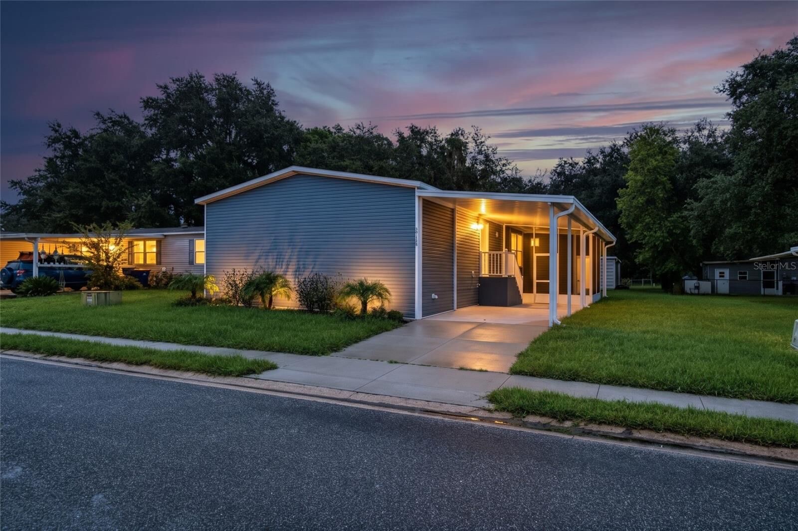 The model, a new home on Huckleberry Way, at dusk